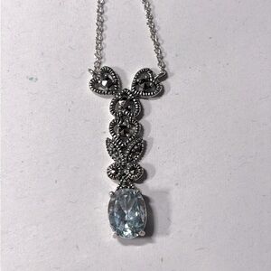 Blue topaz and sterling silver 17” chain and pendant